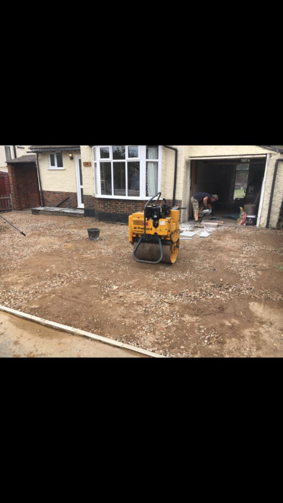 Groundworks in progress, base being rolled before surfacing