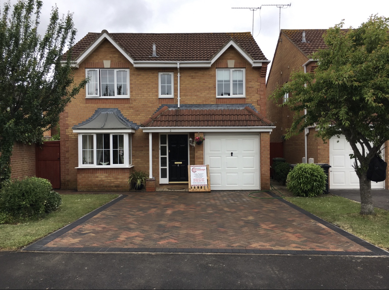 Brindle herringbone block paved driveway at a detached house in Swindon