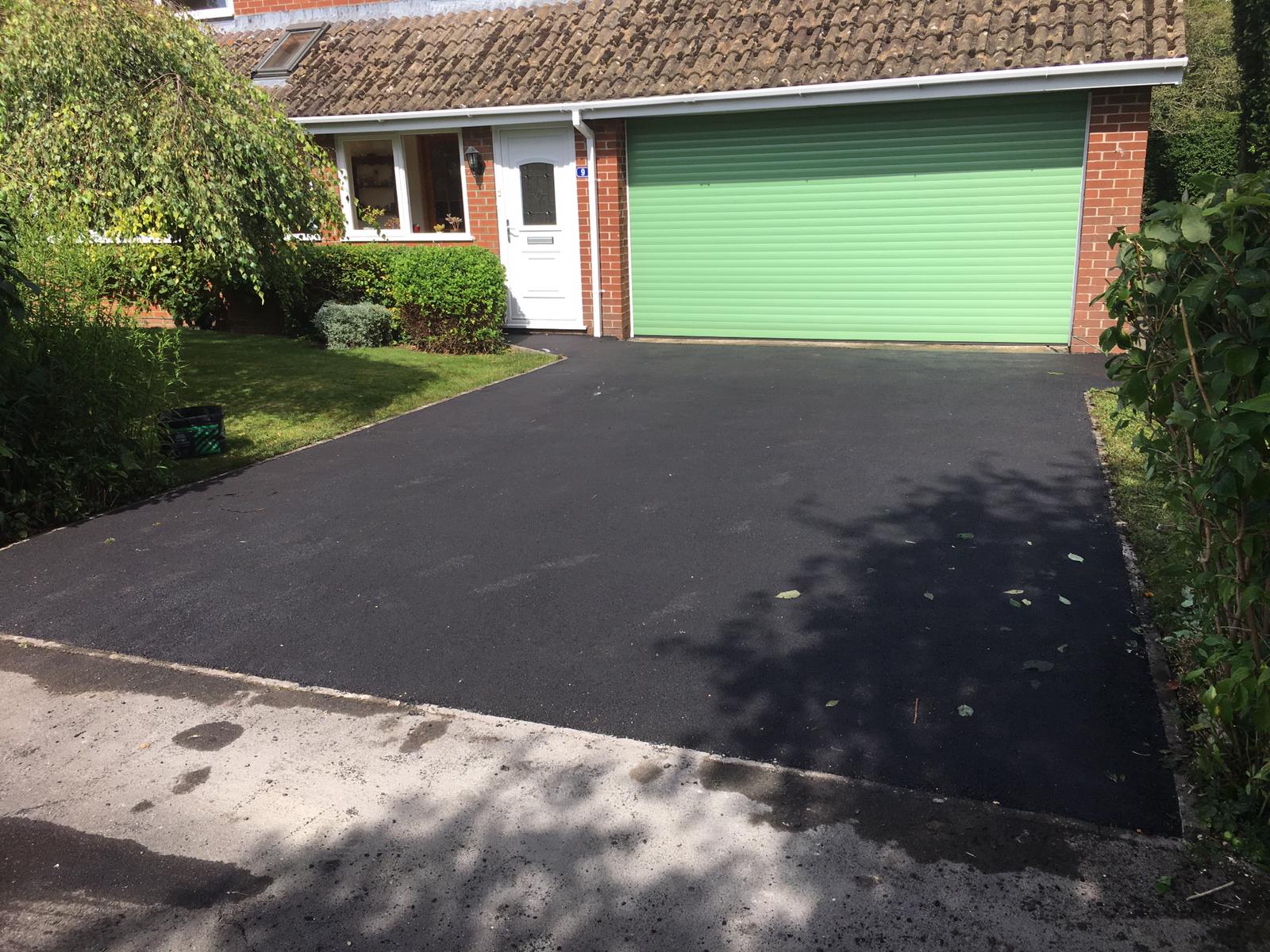 Tarmac driveway with block border in Swindon